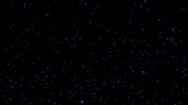 Parlak mavi yıldız parçacıkları siyah soyut arkaplanda sağ üst animasyona akar. Alevli, mavi, parlayan, yanan kül parçacıklarının animasyonu.