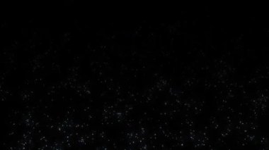Soyut döngü animasyonu. Siyah zemin üzerinde ışıldayan beyaz yıldız toz parçacıkları hareketi. Parçacık tozu yanan sıcak kıvılcımlar alfa kanal geçişleriyle siyah arkaplanda rastgele akıyor