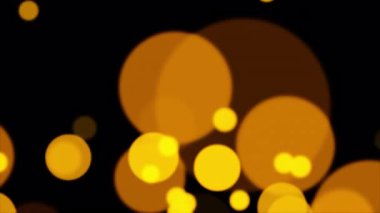 Soyut animasyon turuncu altın bokeh parçacıkları ekran projesi örtüşmesi için siyah arkaplanda akarlar. 4K 3D kusursuz turuncu bokeh parçacıkları havada uçuşuyor.