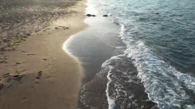 Gün batımı plajı, hava günbatımı plajı ve deniz.