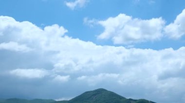 clouds, mountain peak and white clouds timelapse