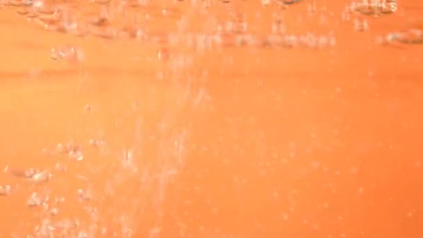 Water Bubbles Water Bubbles Orange Background Slow Motion — Stock Video
