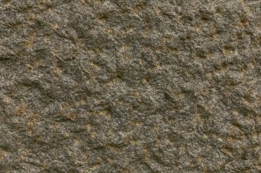 Gri ve krem renkli engebeli taş zemin