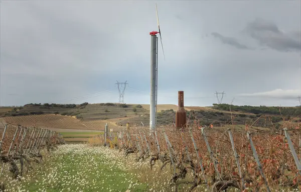 The higher vof Rioja at altitude with windmill and vineyard heater to be used to deal with frost
