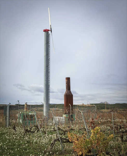 Vineyard windmill and heater used when it is frosty to ensure that the vines do not freeze