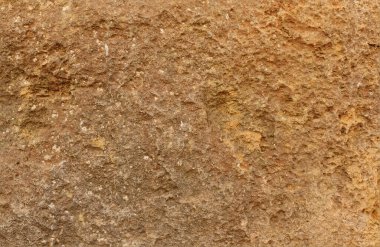 Tarragona, İspanya - 24 Aralık 2024 - Antik kumtaşı kayaların arka planı