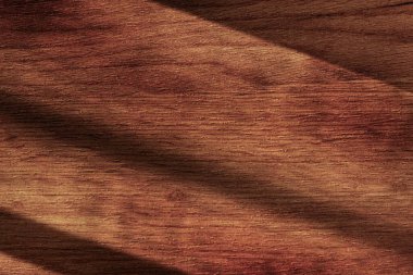 Parlak kahverengi bir gölgenin ahşap arka planı, ahşap doku.