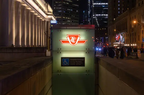 Stock image Toronto, ON, Canada  February 24, 2024: The sign of the Toronto Transit Commission transport company in Downtown Toronto.