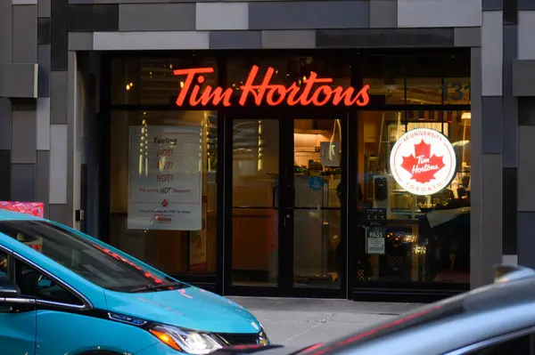 stock image Toronto, ON, Canada - January 20, 2024: Tim Hortons Inc., commonly nicknamed Tim's, or Timmie's is a Canadian coffeehouse and restaurant chain