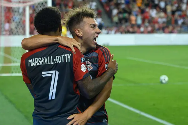 stock image Toronto, ON, Canada - August 4, 2024: Kobe Franklin #19 defender of Toronto FC selebrates the goal with teammates during the Leagues Cup match between Toronto FC (Canada) v C.F. Pachuca (Mexico) at BMO Field (Toronto won 2-1)