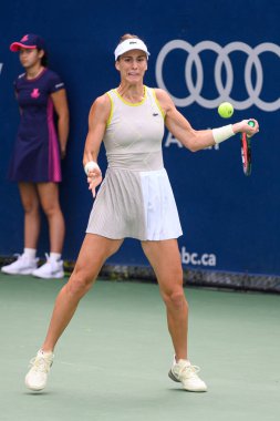 Toronto, ON, Canada - August 4, 2024: Bernarda Pera (USA) plays against Miriam Bulgaru (ROU) during the qualifying match of the National Bank Open at Sobeys Stadium clipart