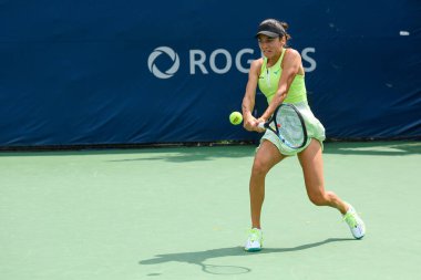 Toronto, ON, Canada - August 4, 2024: Miriam Bulgaru (ROU) plays against Bernarda Pera (USA) during the qualifying match of the National Bank Open at Sobeys Stadium clipart