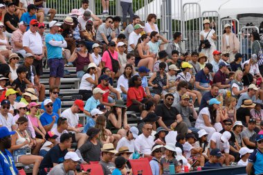 Toronto, ON, Canada - August 4, 2024: Spectators in the stands watch the match of Jule Niemeier (GER) plays against Stacey Fung (CAN) of the National Bank Open at Sobeys Stadium. clipart