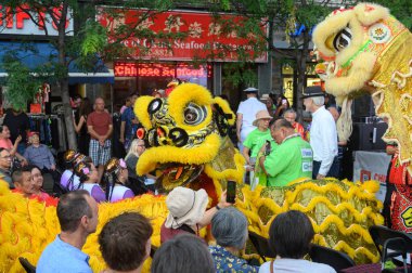 Toronto, ON, Canada - August 17, 2024:  Open ceremony of the Toronto Chinatown Festival 2024 on the main stage on Spadina Avenue. clipart