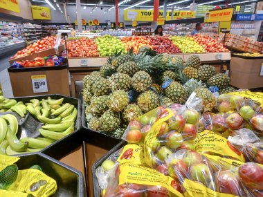 Toronto, On, Canada - August 23, 2024: Indoor view of the produce department in No Frills grocery store in Canada. clipart