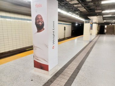 Toronto, ON, Canada - June 9, 2024: View at the Yonge subway station inside clipart