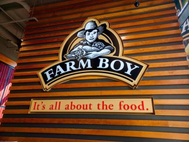 Toronto, Kanada 30 Temmuz 2024: Binanın ön cephesinde Çiftlik Çocuğu mağazasının logosuna bakın..