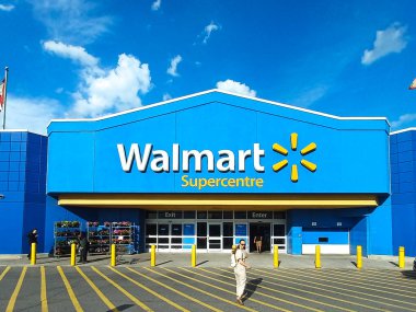 Toronto, ON, Canada - April 30, 2024: View at the logo front sign of the Walmart super store in America clipart