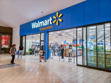 Toronto, ON, Canada - April 30, 2024: View at the logo front sign of the Walmart super store in America. clipart