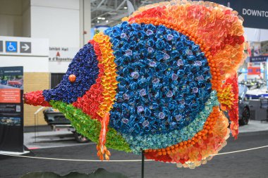 Toronto, ON, Canada  January 18, 2025: Displayed at the 67th Toronto International Boat Show, at the Exhibition Place, a colorful tropical fish sculpture is made of flowers..