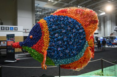 Toronto, ON, Canada  January 18, 2025: Displayed at the 67th Toronto International Boat Show, at the Exhibition Place, a colorful tropical fish sculpture is made of flowers..