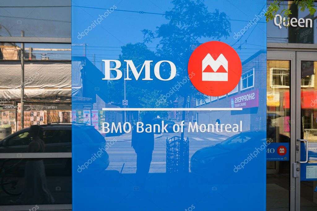Toronto, ON, Canada  July 20, 2024: The logo and brand sign of the Bank of Montreal BMO branch in Canada..