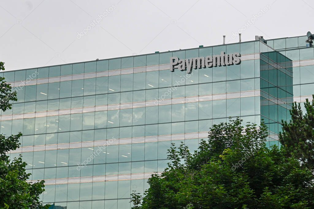 Toronto, ON, Canada  June 20, 2024: View at the Paymentus Fintech IT company logo..