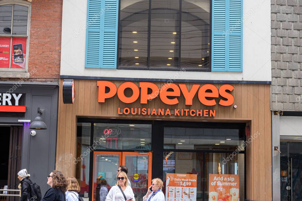Toronto, ON, Canada  August 12, 2025: View at the sign of Popeyes Louisiana Kitchen company..