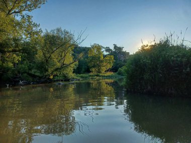  View of the Humber River under a clear blue summer sky.