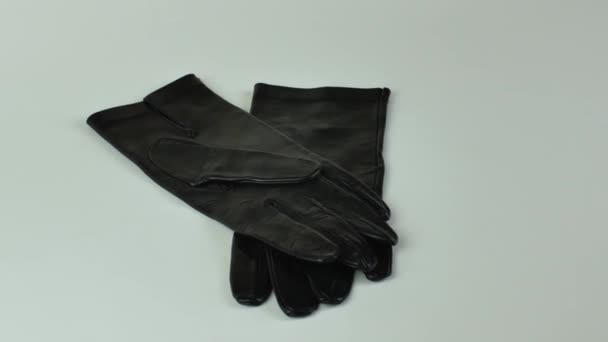 Pair New Black Leather Gloves Isolated Light Background Graceful Female — Stock Video