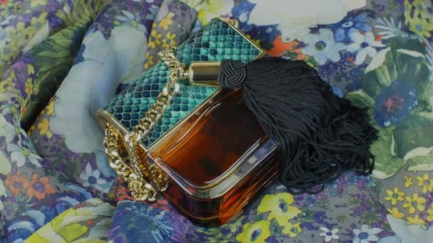 Female Perfume Original Bottle Form Womans Handbag Gold Chain Background — Stock Video