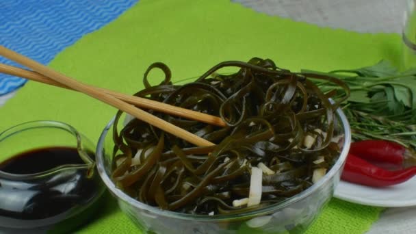 Seaweed Kelp Salad Onion Soy Sauce Bowl Wooden Chopsticks Green — Vídeos de Stock