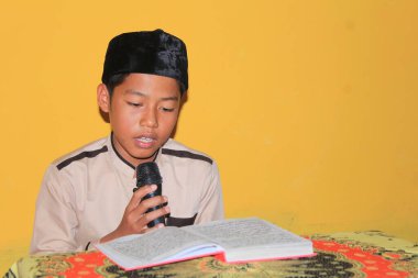 Bawang, Jawa Tengah, Indonesia - October 19 2022. The students are gathering to read the quran