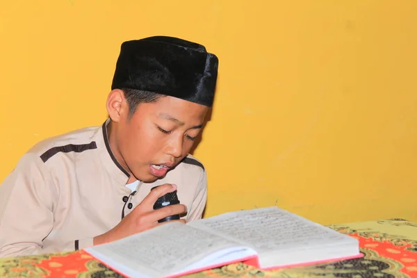Bawang, Jawa Tengah, Indonesia - October 19 2022. The students are gathering to read the quran