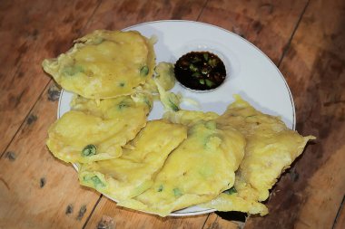 Tempe Goreng ( Fried Tempeh ) also known as Mendoan, traditional indonesian culinary food made from soybean