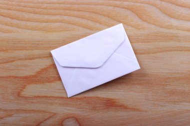 Envelope paper on a wooden board