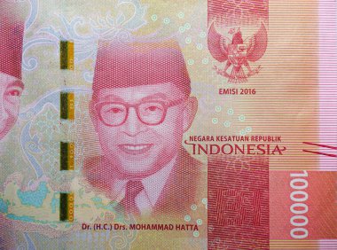 A replica of the Indonesian currency, a 100,000 rupiah note