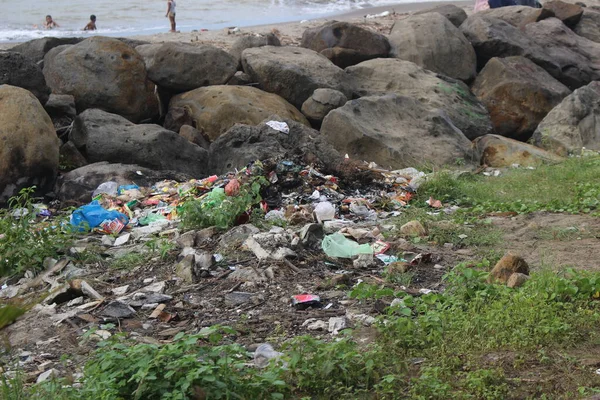 stock image Garbage on the beach disturbs the environment and views