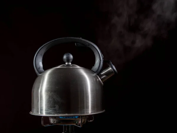 Stainless Steel Electric Kettle With Boiling Water, Abstract Color  Background. Stock Photo, Picture and Royalty Free Image. Image 38082941.