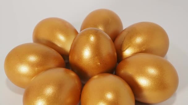 Χρυσά Αυγά Λευκό Φόντο Χρυσά Αυγά Κότας Πλούτο Σύμβολο Υψηλής — Αρχείο Βίντεο