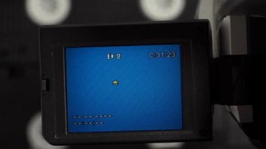 Vintage retro video camera. Outdated old technology, film production. Close-up.