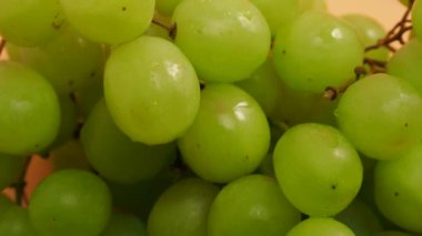 Rotating green grapes. Ripe green grapes. Close-up.