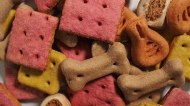 Rotating Dog Treats. Treats for dogs on a white background. Dog food close up.