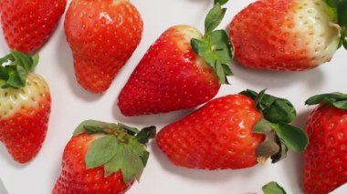 Ripe strawberries on a white background. Strawberries close up. Red strawberry.