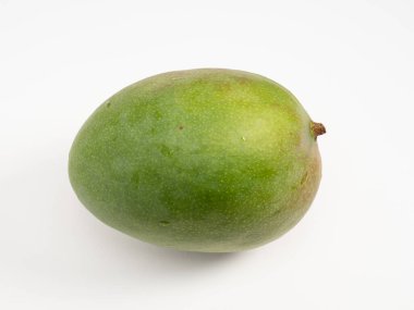 Ripe mango on a white background. Fresh mango. Close-up.
