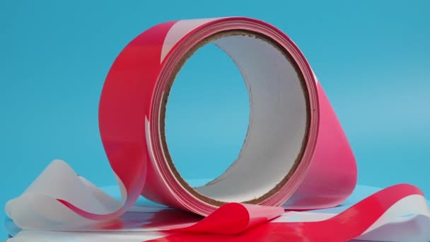 Roll Barrier Tape Blue Background Close — Stockvideo