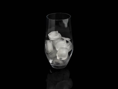 Glass with ice on a black background. Close-up.