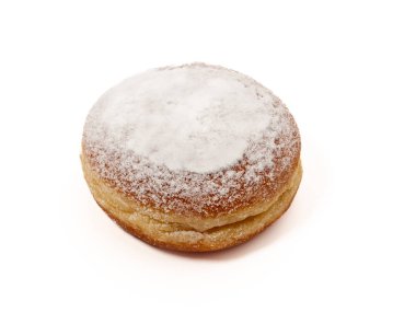 Freshly baked and dusted with powdered sugar German donuts. Donut berliner or krapfen on white background.