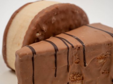 Piece of chocolate cake isolated on white background. A slice of chocolate cake.