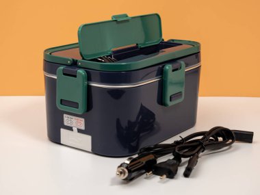 Heated lunch box for carrying and storing food. Lunch box close up.